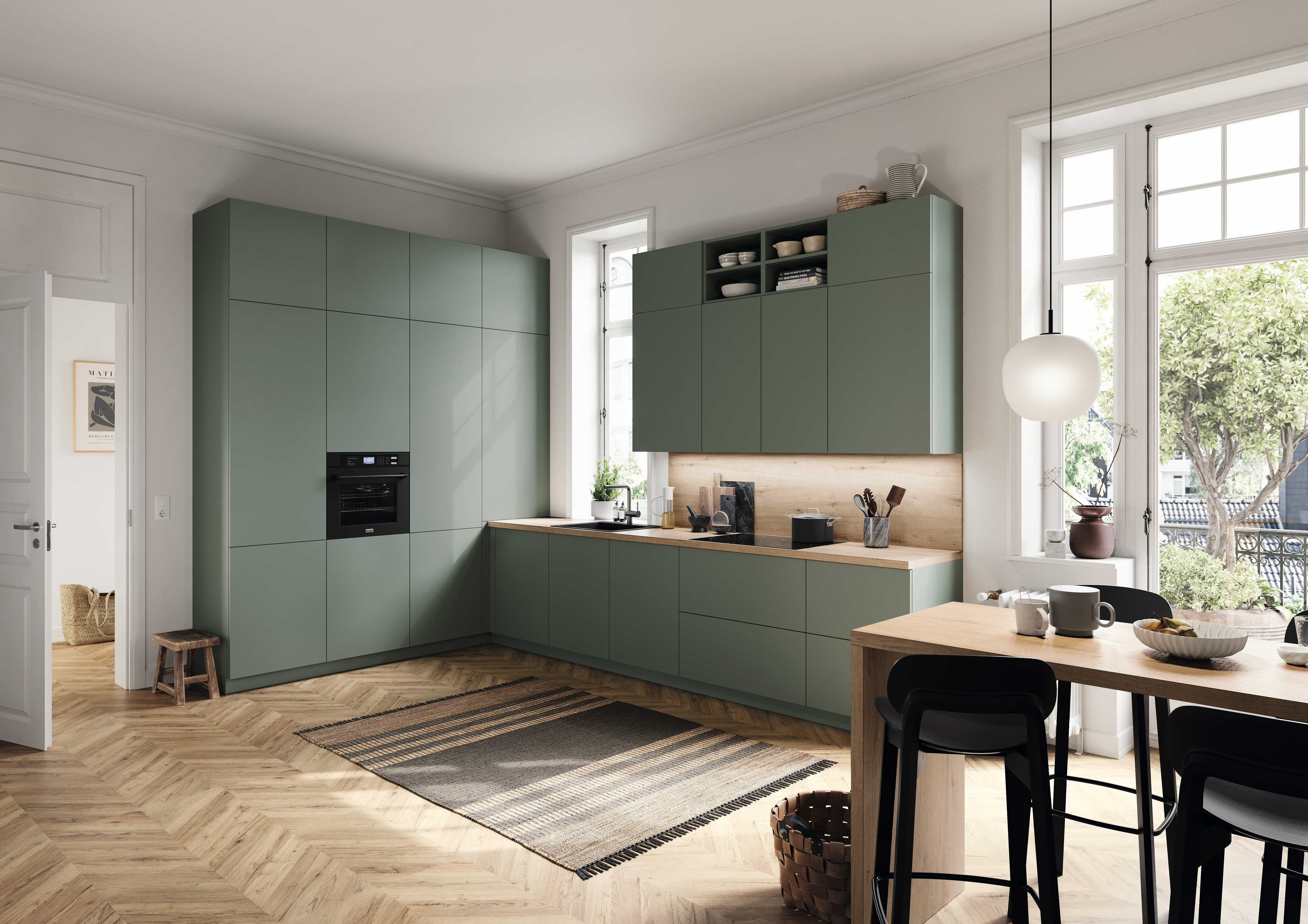 Kitchen in Reed Green with handleless fronts and Light Natural Davenport Oak worktop