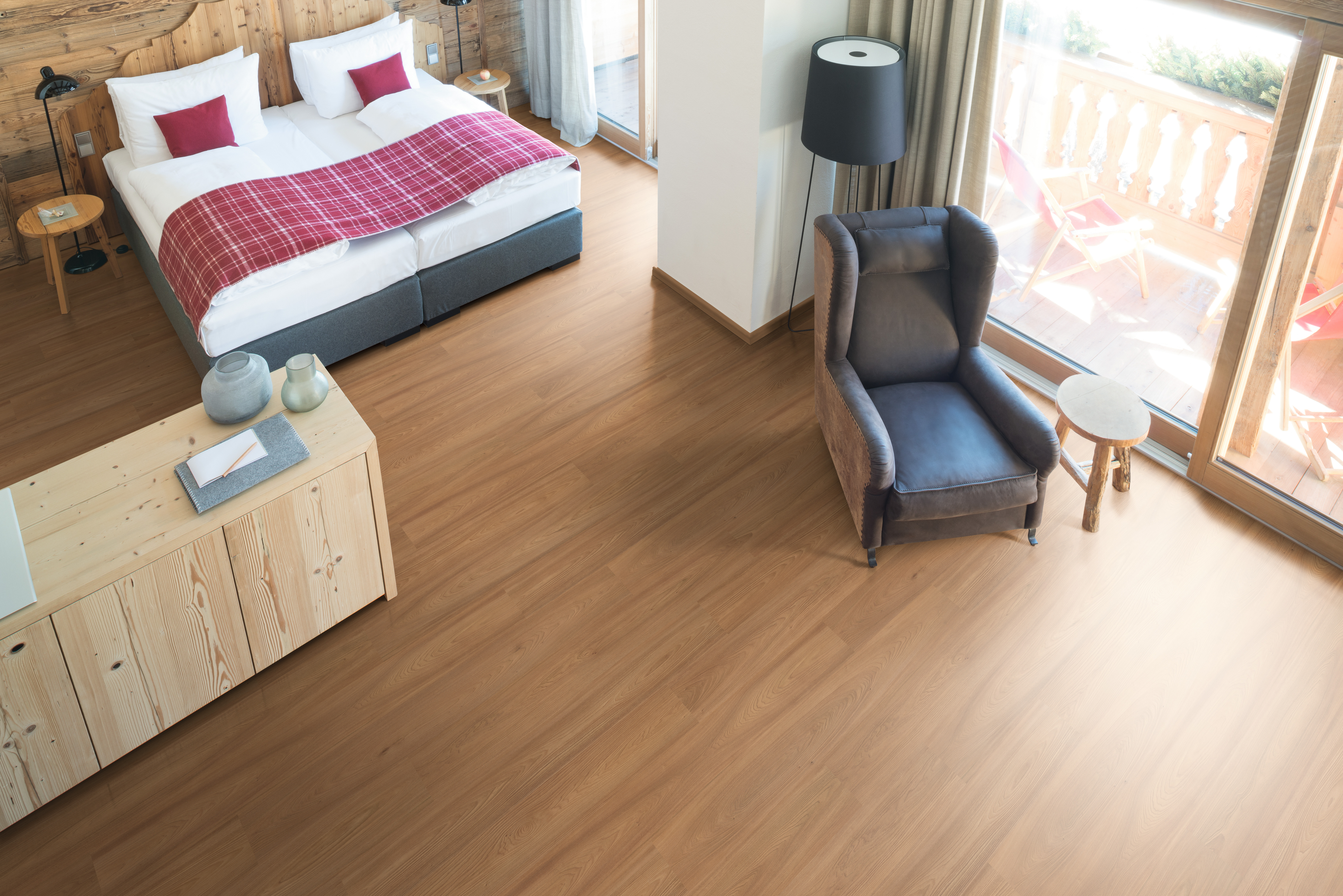 Wide floorboards emphasise the size of the space
