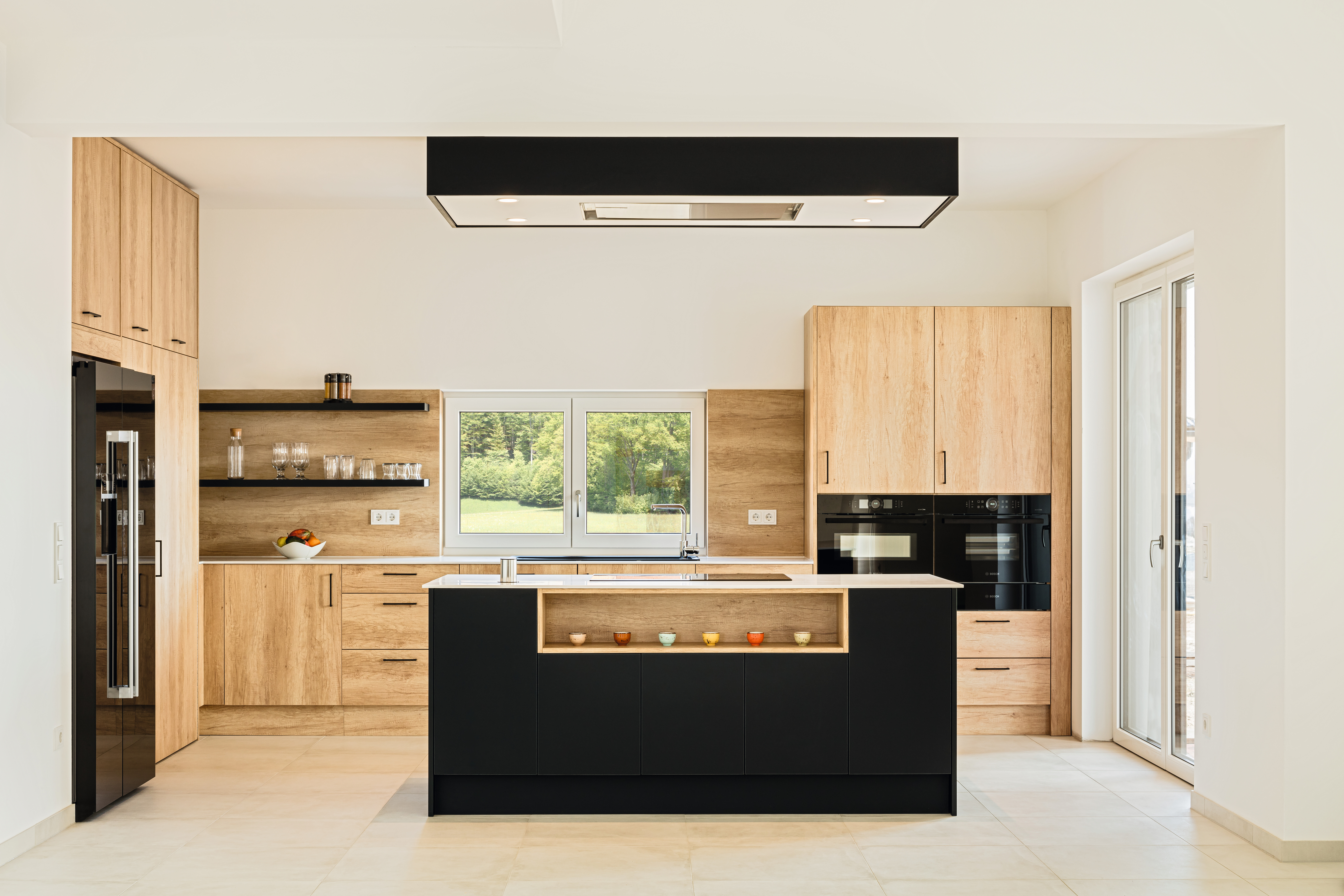 Elegant and natural kitchen design by Fuzzy's Woodart.