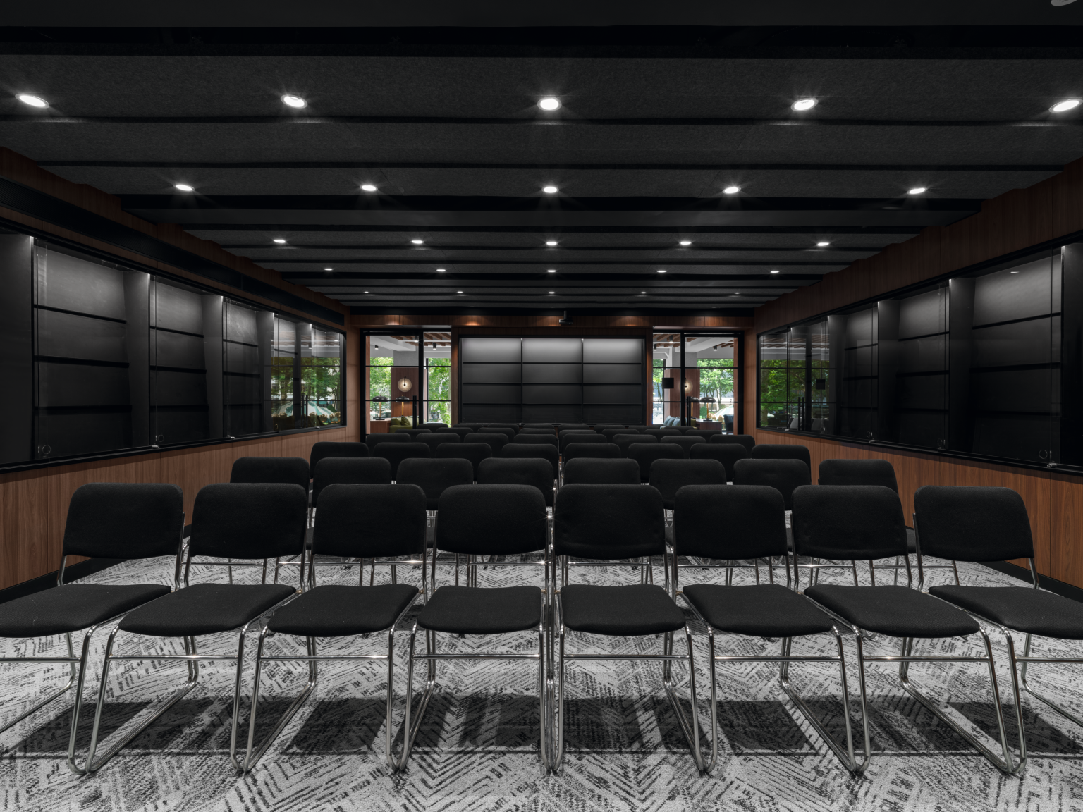 U999 PM Black paneling defines the presentation space. 