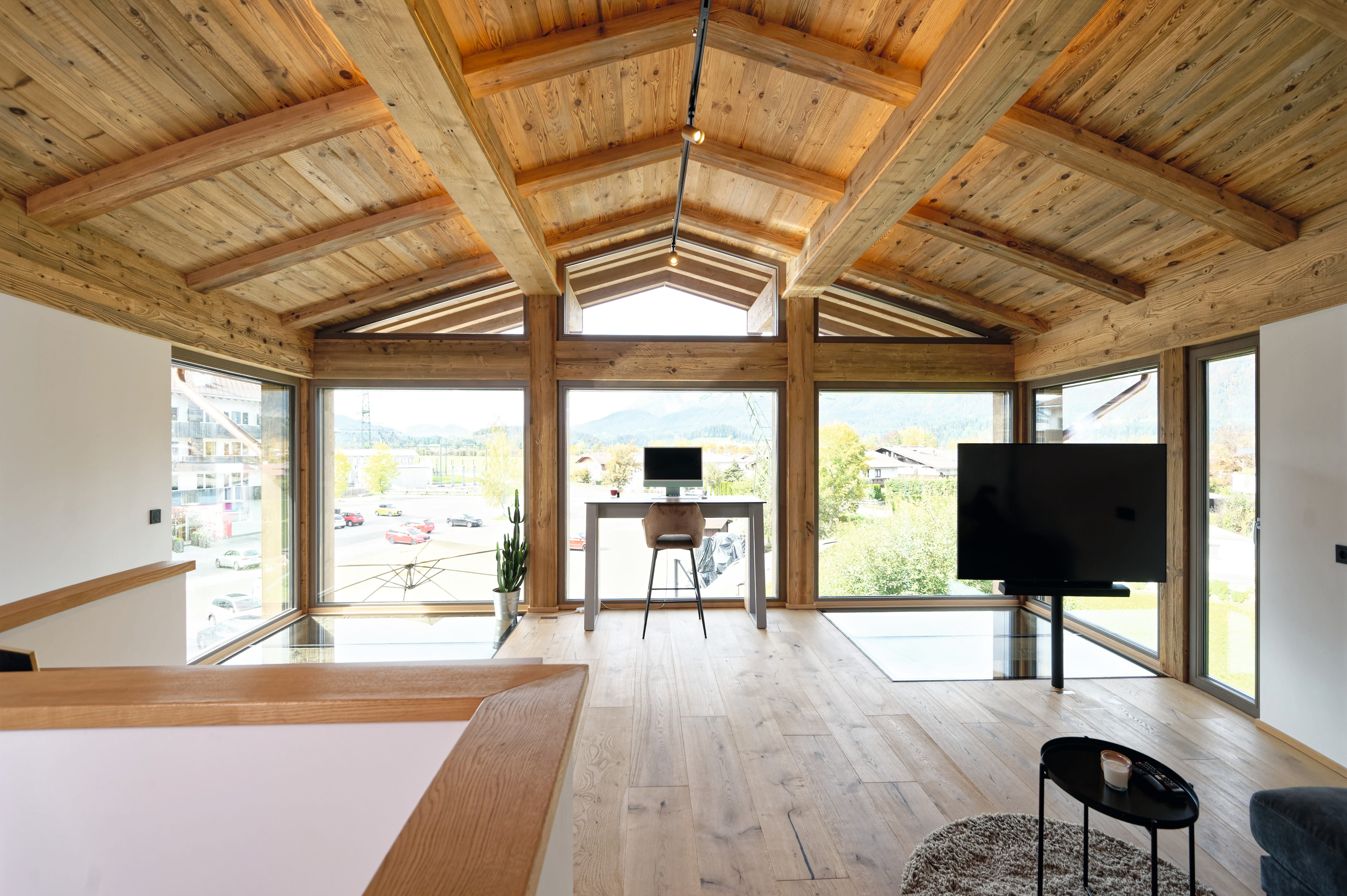 The new structure on the upper floor was equipped with exposed beams.