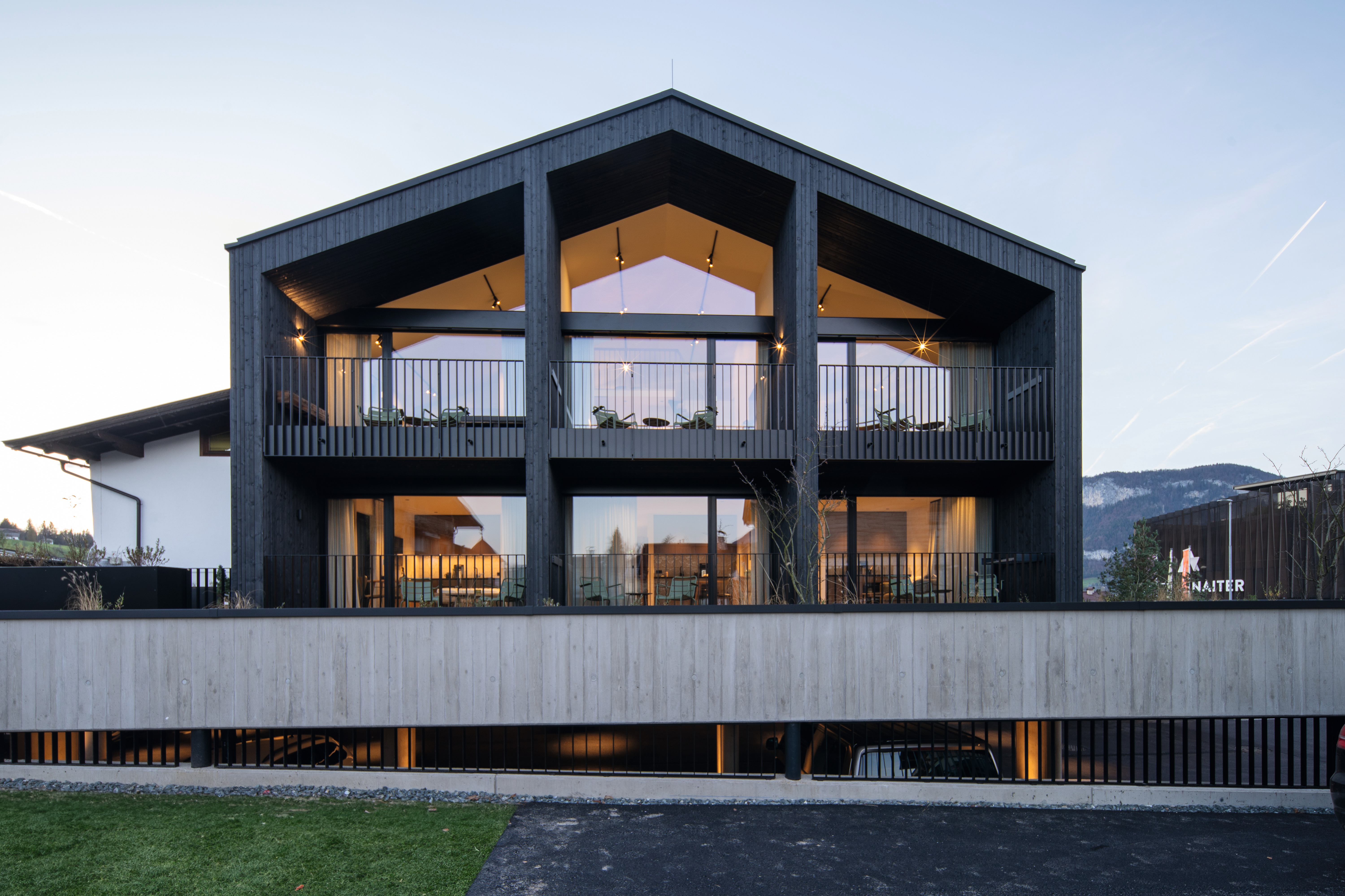 The "A-HOME" staff house has six residential units that show how stylish living can work in a small space.
