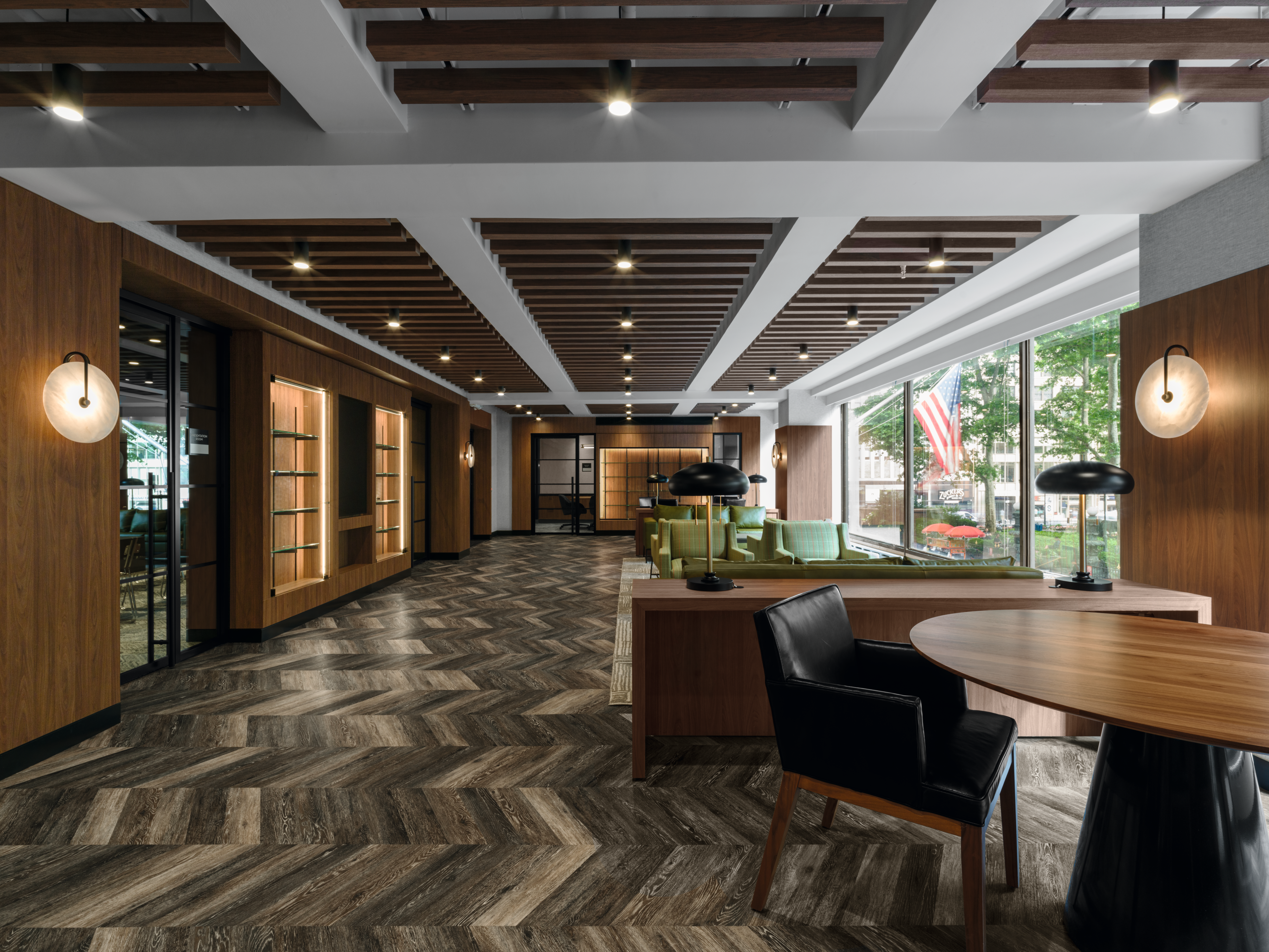 Wall paneling and ceiling slats in H3791 ST12 Auburn Carini Walnut. 