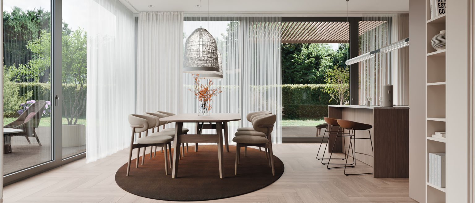 Interijer otvorenog tlocrta u kojem su kuhinja, blagovaonica i dnevni boravak povezani usklađenim odabirom materijala.