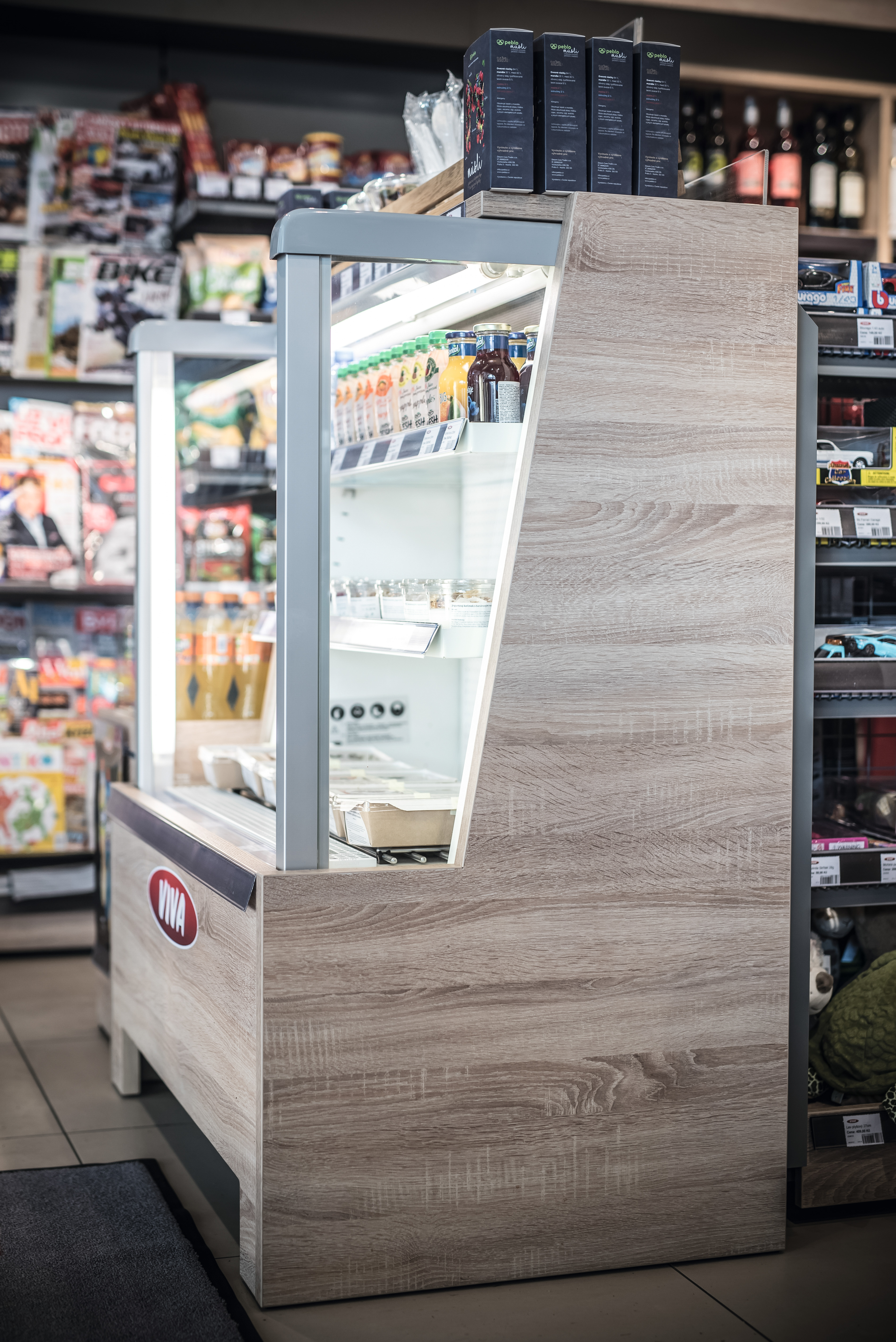 Drink displays units in the newly-designed OMV shop feature the H1145 Natural Bardolino Oak decorative material with its distinctive ST 10 surface texture.