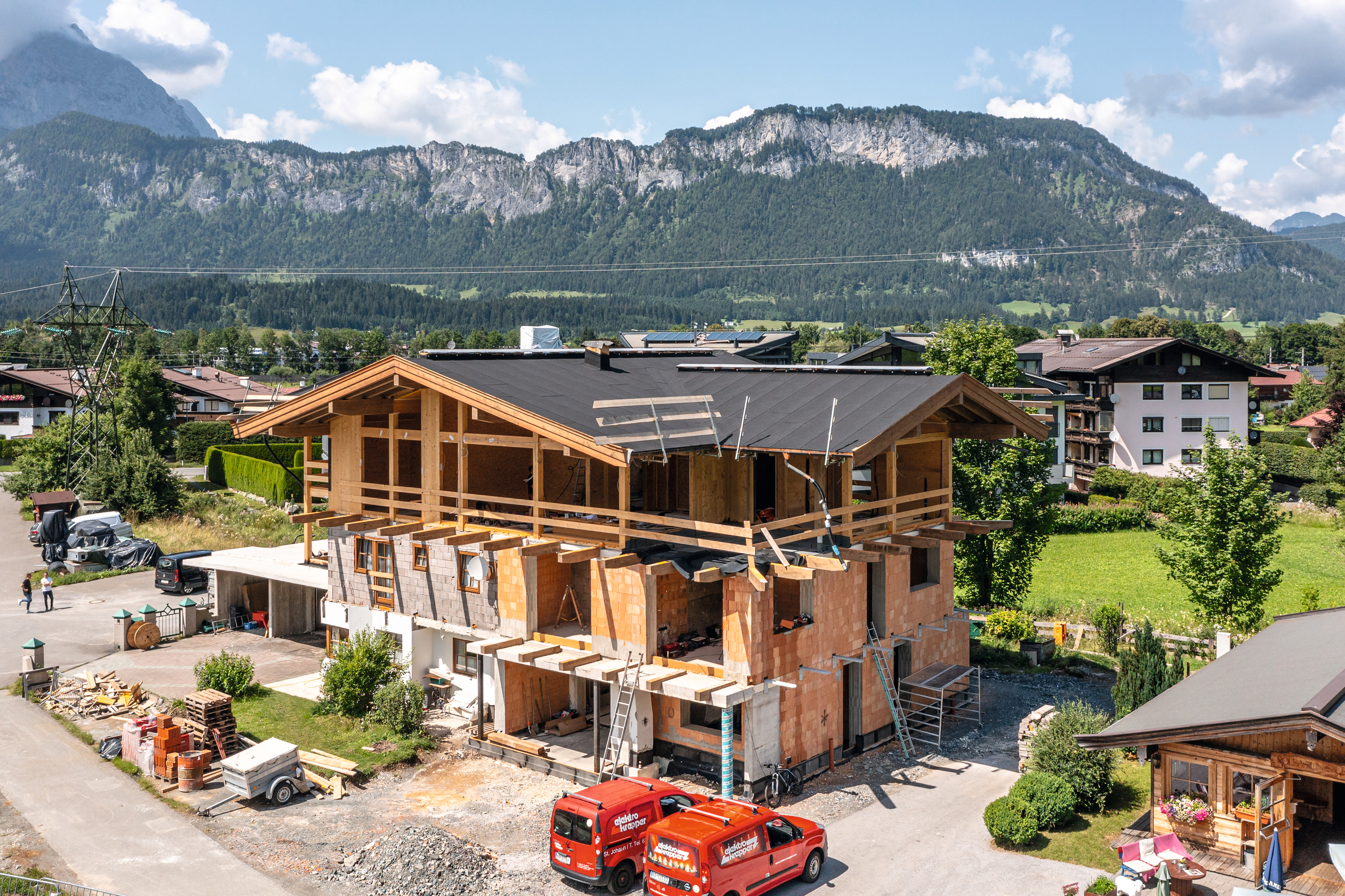 Wood was used for the first and second floor extensions.