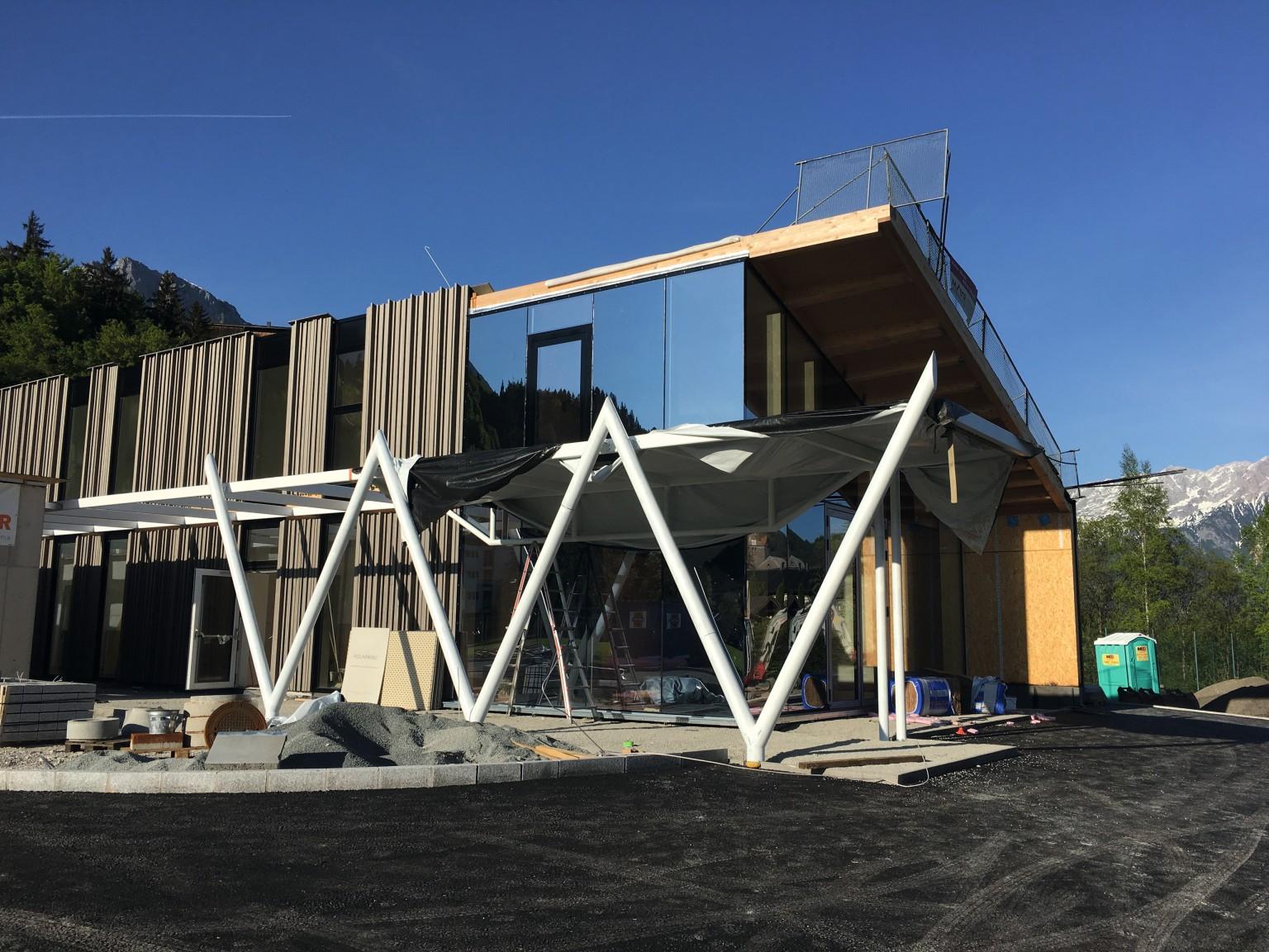 The upper section of the building has been created using wood construction.