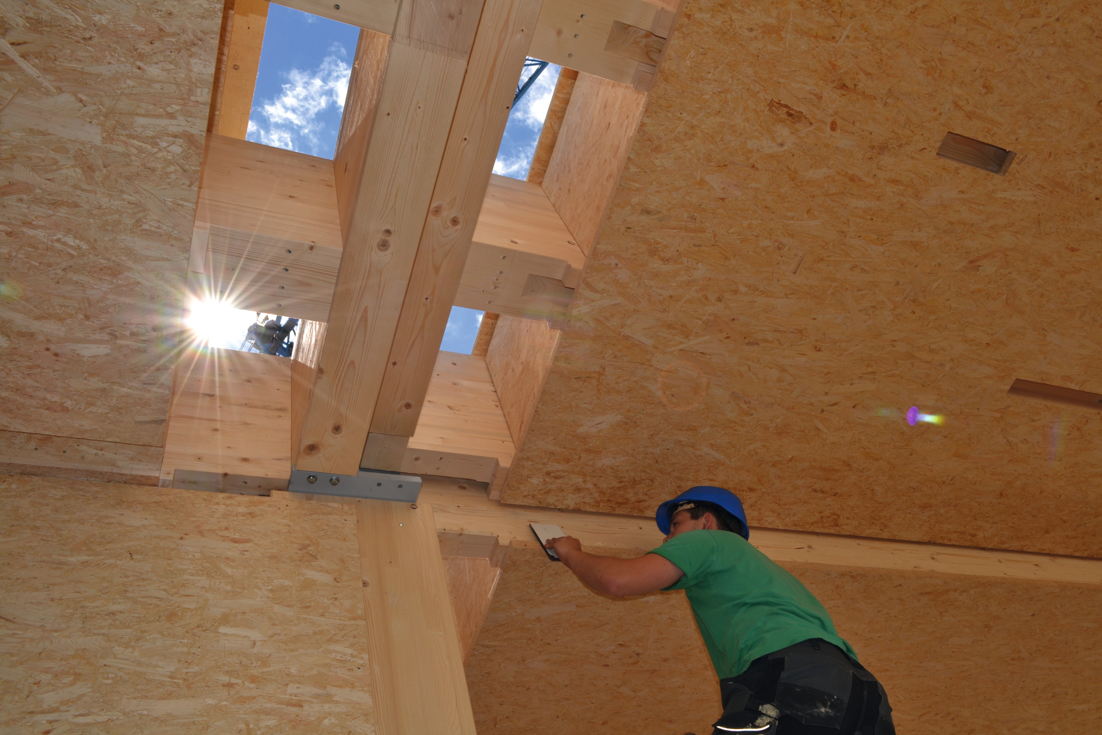 Timber beam ceiling closed on both sides with OSB