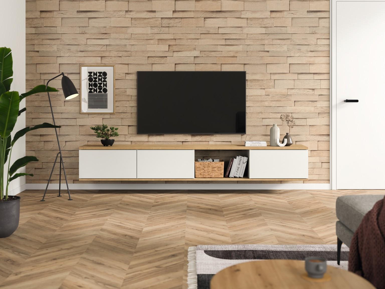 Door het blokeffect wordt de DecoWall in het decor DO007 Laxfield Eik een blikvanger in de woonkamer, terwijl rommelige kabels slim worden verborgen. 