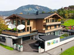 A single-family house was converted into a multi-family house in St. Johann in Tirol.