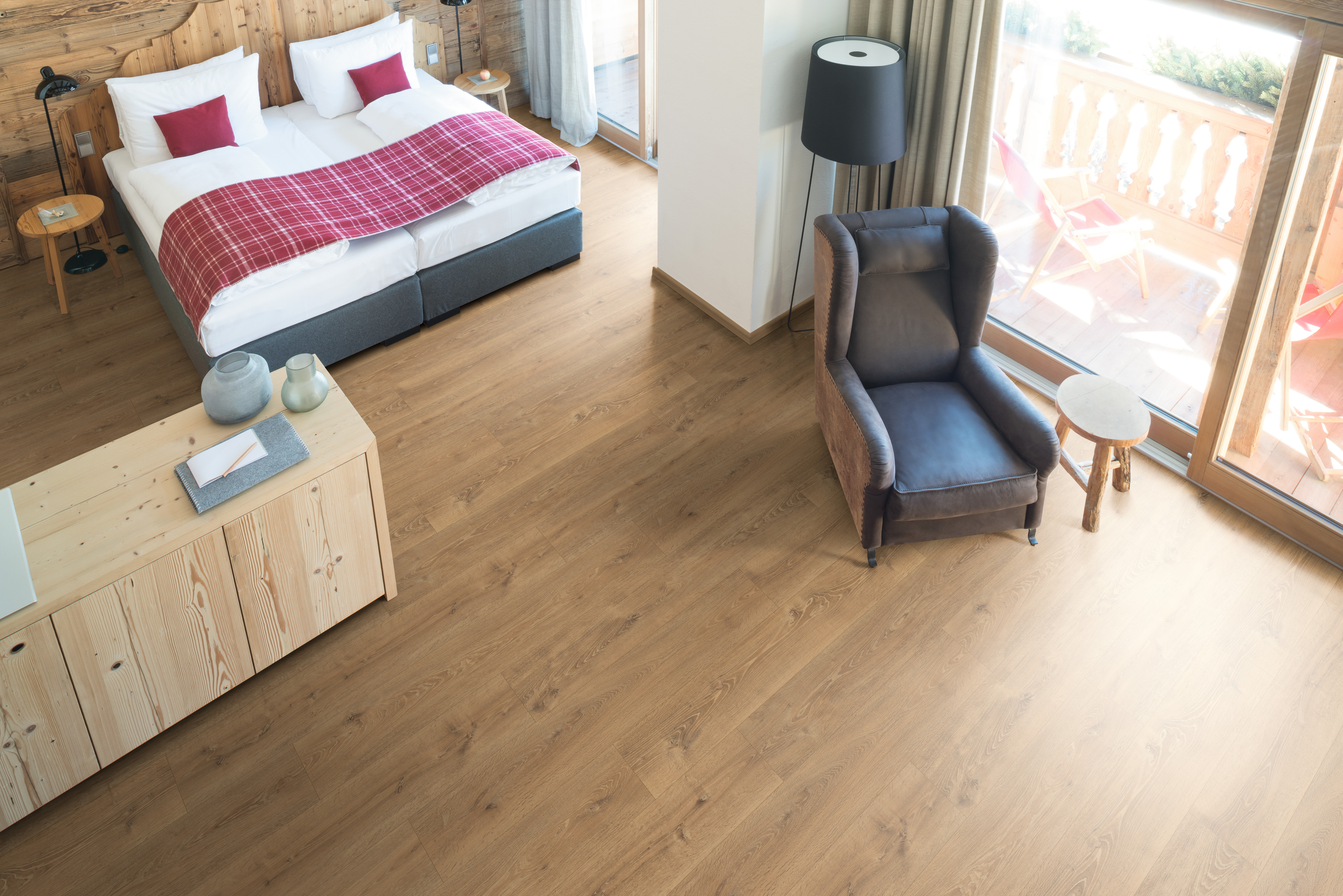 Wide floorboards emphasise the size of the space