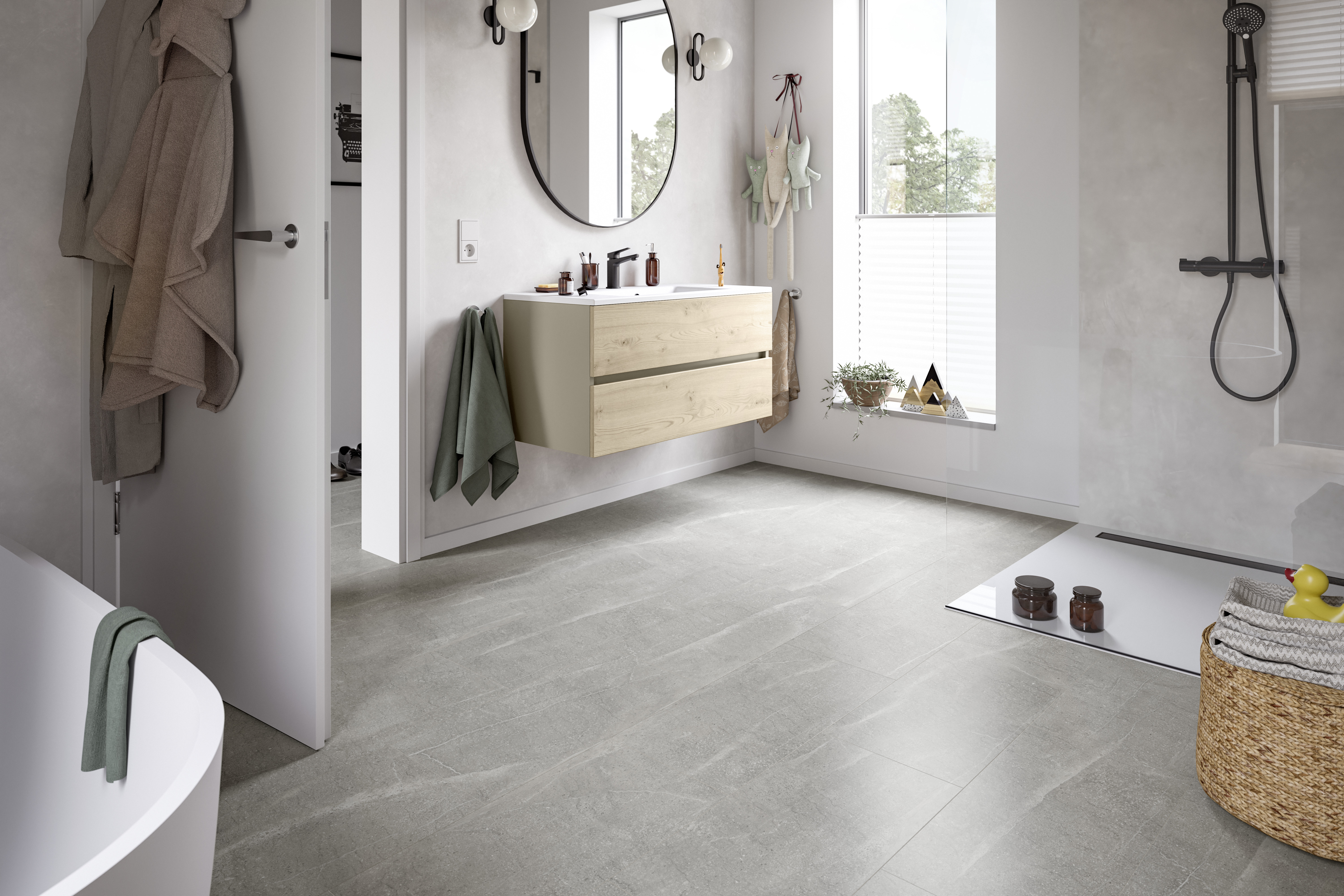 Baño moderno con piso laminado NatureSense Aqua+: superficie robusta, protección contra la hinchazón y resistencia al agua durante 72 horas.
